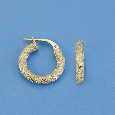18K AROS HUECO GRANILLADO. 16 X 3 MM. 1.60GR