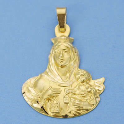 18K VIRGEN CARMEN SILUETA. 38 X 29 MM. 7.70 GRS.