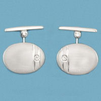 18K GEMELOS ORO BLANCO OVAL CON CIRCONITAS.